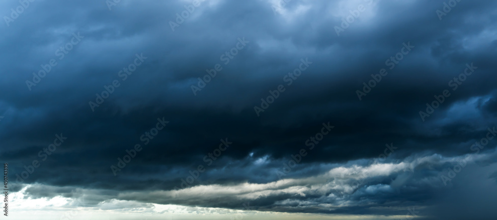 Storm sky with dark grey cumulus clouds background texture, thunderstorm Storm sky with dark grey cumulus clouds background texture, thunderstorm