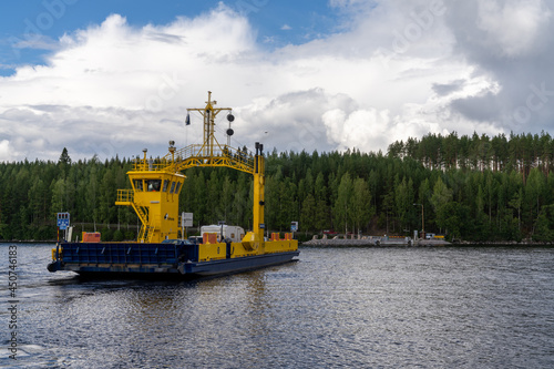 the landing at Enonvesi Lake with the ferry transporting vehicles to the other side