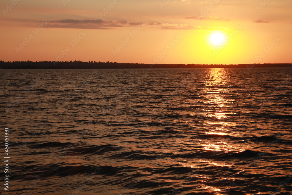 Picturesque view of beautiful sunset on riverside Picturesque view of beautiful sunset on riverside