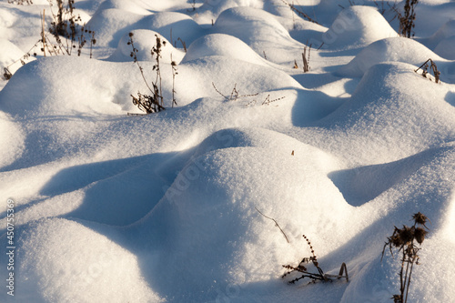 hummocks in the swamp large drifts after snowfalls and blizzards