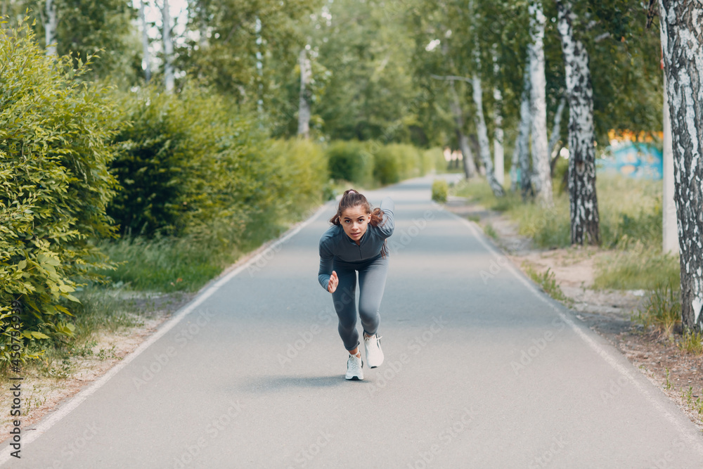 custom made wallpaper toronto digitalAthletic woman on track starting to run. Jogging pretty girl.