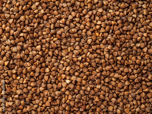 Buckwheat, raw, not cooked, solid background, food for a diet, close-up