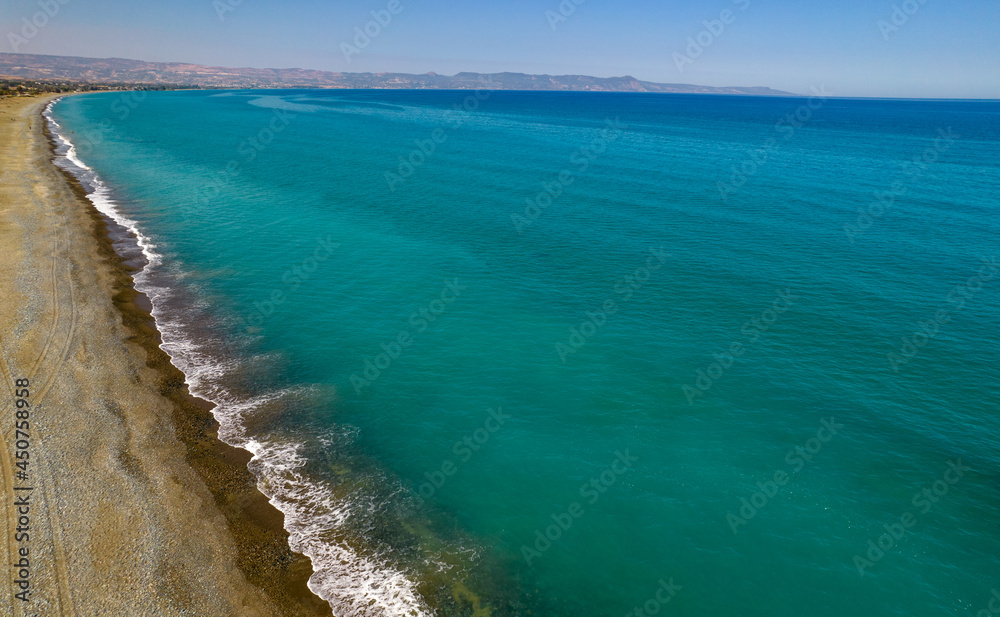 Aerial drone scenery of the coastline seascape with sandy beautiful beach. Paphos Cyprus