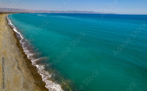 Aerial drone scenery of the coastline seascape with sandy beautiful beach. Paphos Cyprus © Michalis Palis