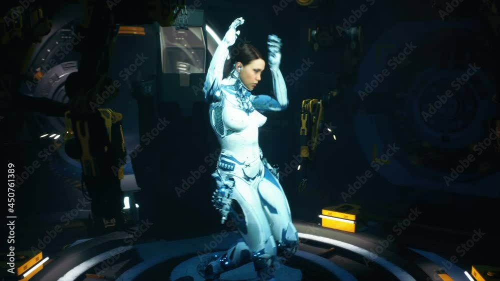 Cyber girl is dancing in her futuristic cyber laboratory.The woman was ...