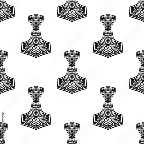 Seamless pattern with weapons of the god Thor - mjolnir, on a white background. Beautiful decorative black-white male background. Vector scandinavian illustration for textile decoration, design photo