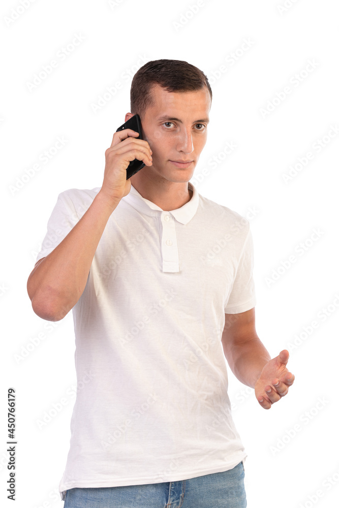 Young man making a phone call with a mobile phone Young man making a phone call with a mobile phone