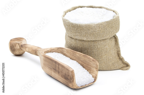 Salt in a sack isolated on a white background. Salt . Salt in a burlap sack. Salt in a jute bag.