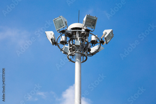 Lamp post electricity industry on blue sky background