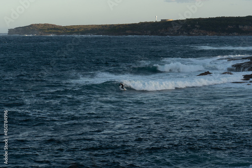 male surfer in action on a wave in a remote island location