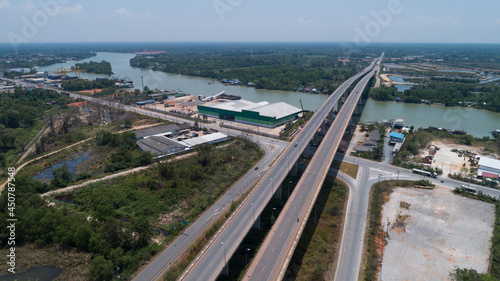 Drone view Top down of Tapee River and Bridge in Surat Thani thailand. © panya99