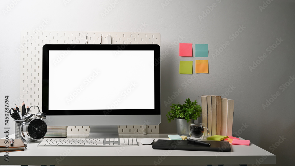 Front view computer with blank screen at modern workplace. Front view computer with blank screen at modern workplace.