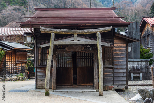wooden temple with torii gate of Narai-juku, Kiso valley