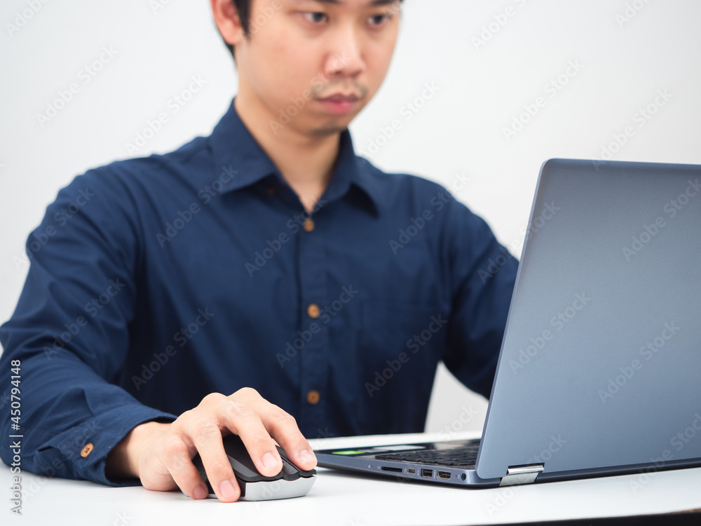 Man using laptop on table crop shot,Working from home concept Man using laptop on table crop shot,Working from home concept