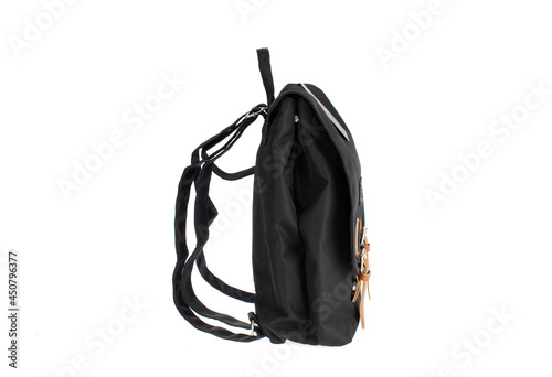Isolated closeup studio shot of new small casual modern trendy fashionable fabric black messenger bag on white background