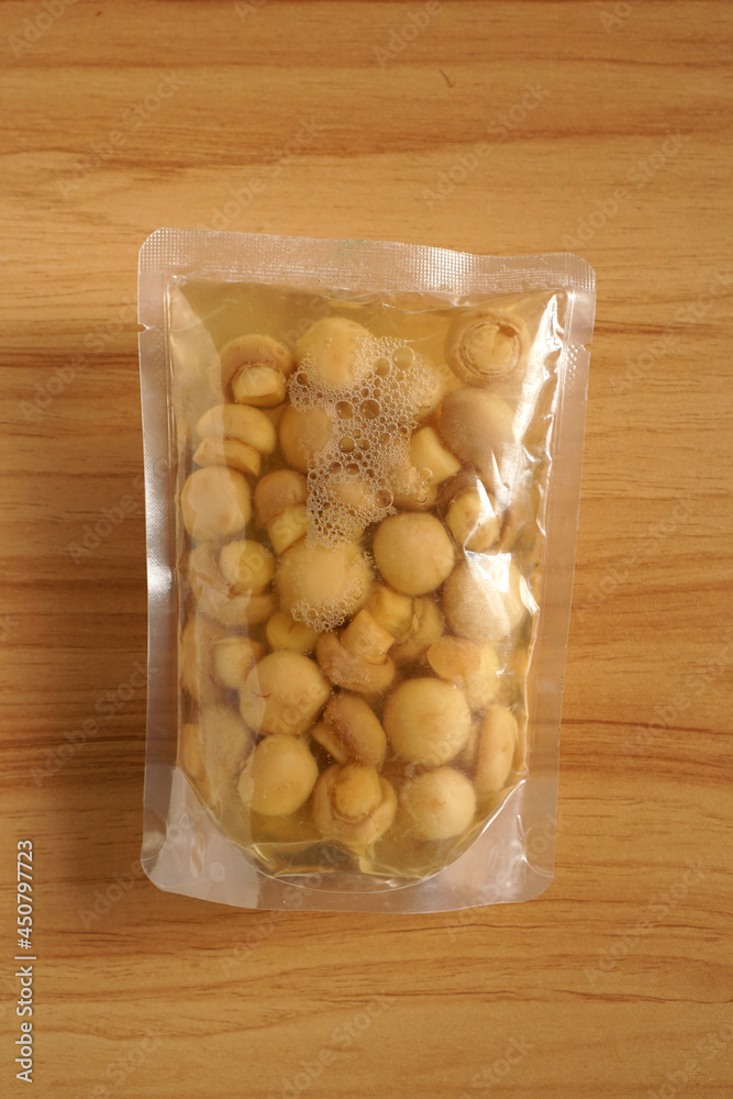 Packaged Button Mushroom or Agaricus bisporus is one of the consumption mushroom or fungus Packaged Button Mushroom or Agaricus bisporus is one of the consumption mushroom or fungus
