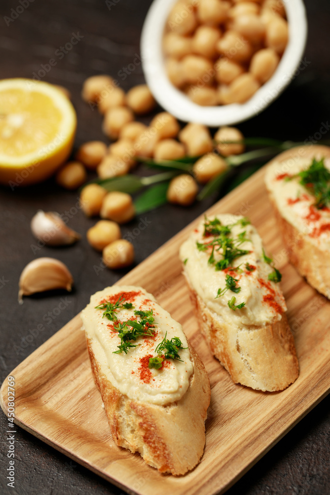 Hummus, bread and ingredients, food styling 