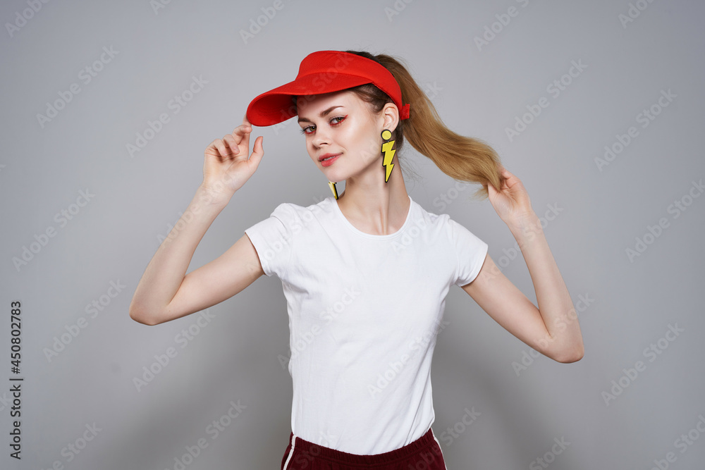 girl in red cap yellow blocking earrings fashion summer girl in red cap yellow blocking earrings fashion summer