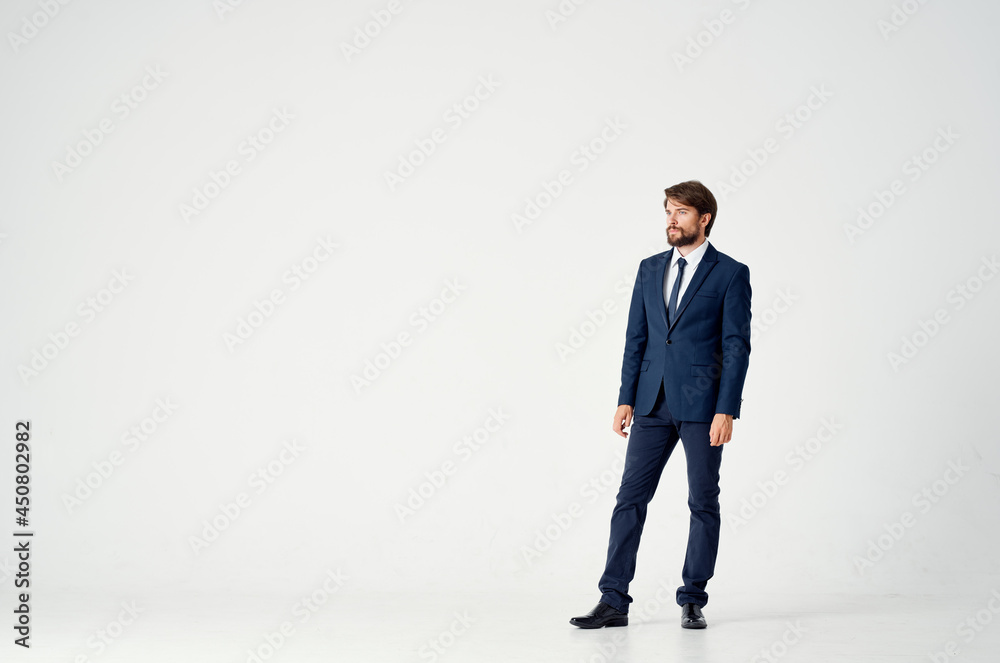 The man in a suit posing executive office Studio The man in a suit posing executive office Studio