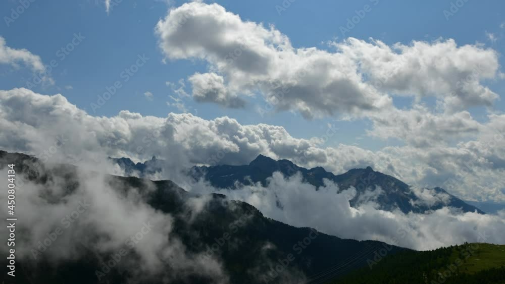 Time-lapse of clouds over the mountains in strong post-thunderstorm motion Time-lapse of clouds over the mountains in strong post-thunderstorm motion