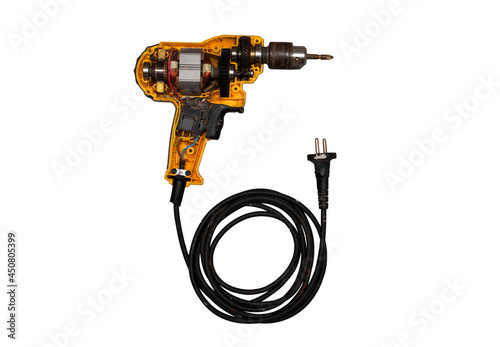 detachable used electric drill on white background The lid opens to reveal the internal components that include the motor, gear and switch.