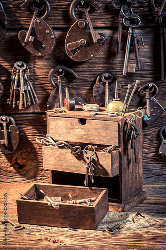 Vintage locksmiths workshop with tools to repair. Ancient locksmiths workshop.