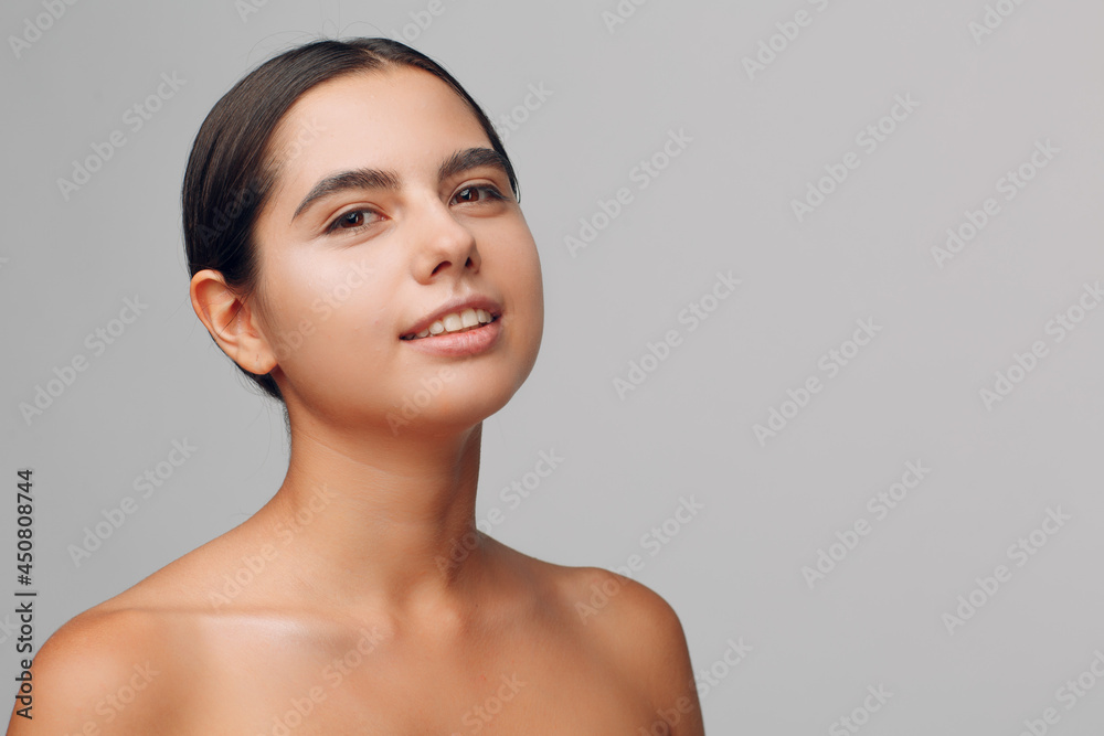 Portrait of young beautiful positive woman with nude make up Portrait of young beautiful positive woman with nude make up