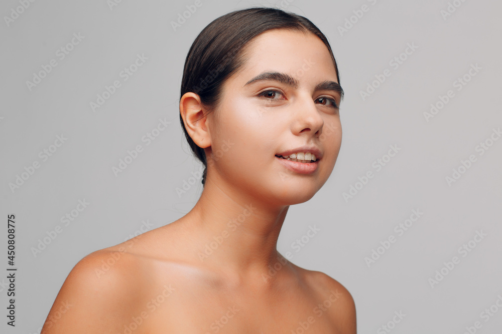 Portrait of young beautiful positive woman with nude make up Portrait of young beautiful positive woman with nude make up