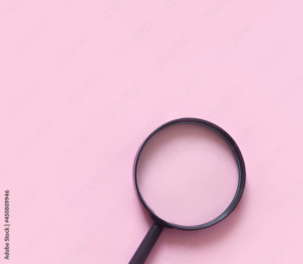 magnifying glass on pink background, flat lay minimal style magnifying glass on pink background, flat lay minimal style