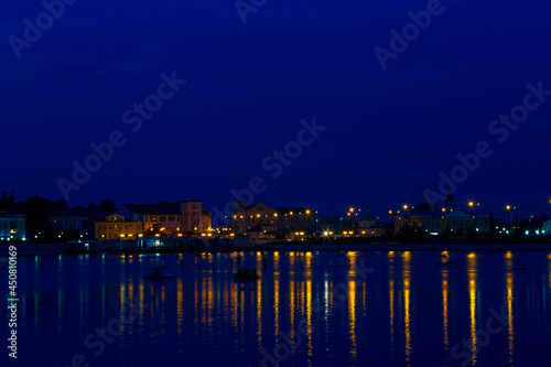 the bay of the city of Cheboksary with reflections of evening lights