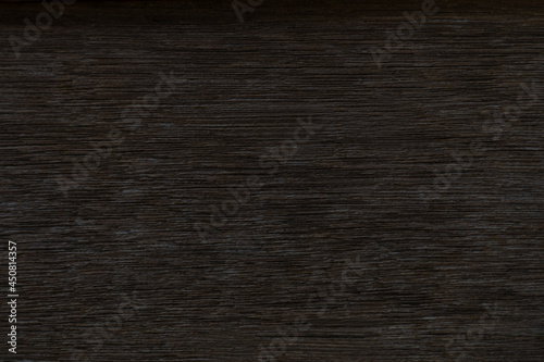  Dark brown wood and uneven surfaces for texture and copy space in background