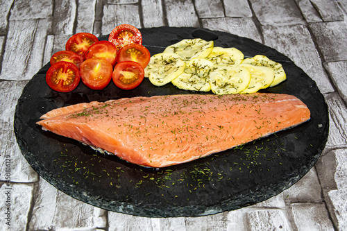 salmon tomatoes and zucchini in vegan food
