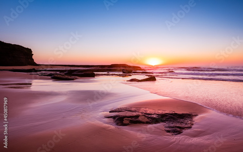Fototapeta Naklejka Na Ścianę i Meble -  Beautiful Rennies Beach against Sunrise Sky