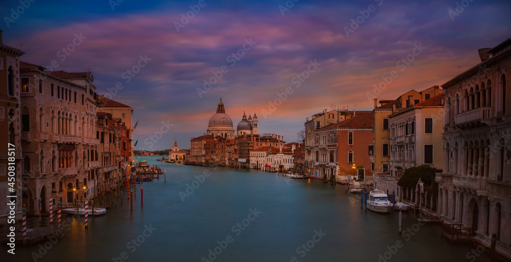 Sunset sky scene at  Grand Canal and Basilica Santa Maria della Salute in Venice,Italy