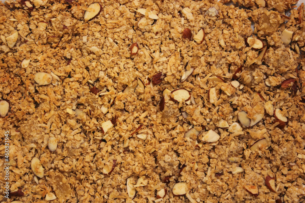 Closeup Background Image of Organic Granola With Almonds and Coconut Closeup Background Image of Organic Granola With Almonds and Coconut