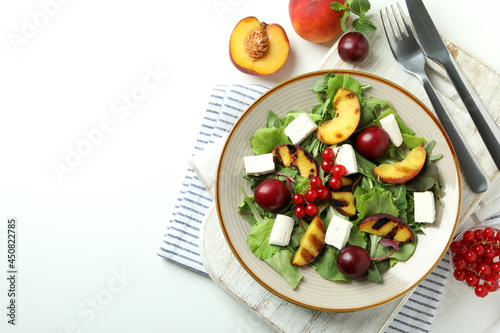 Concept of tasty food with salad with grilled peach  top view