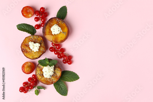 Concept of delicious food with grilled peach on pink background