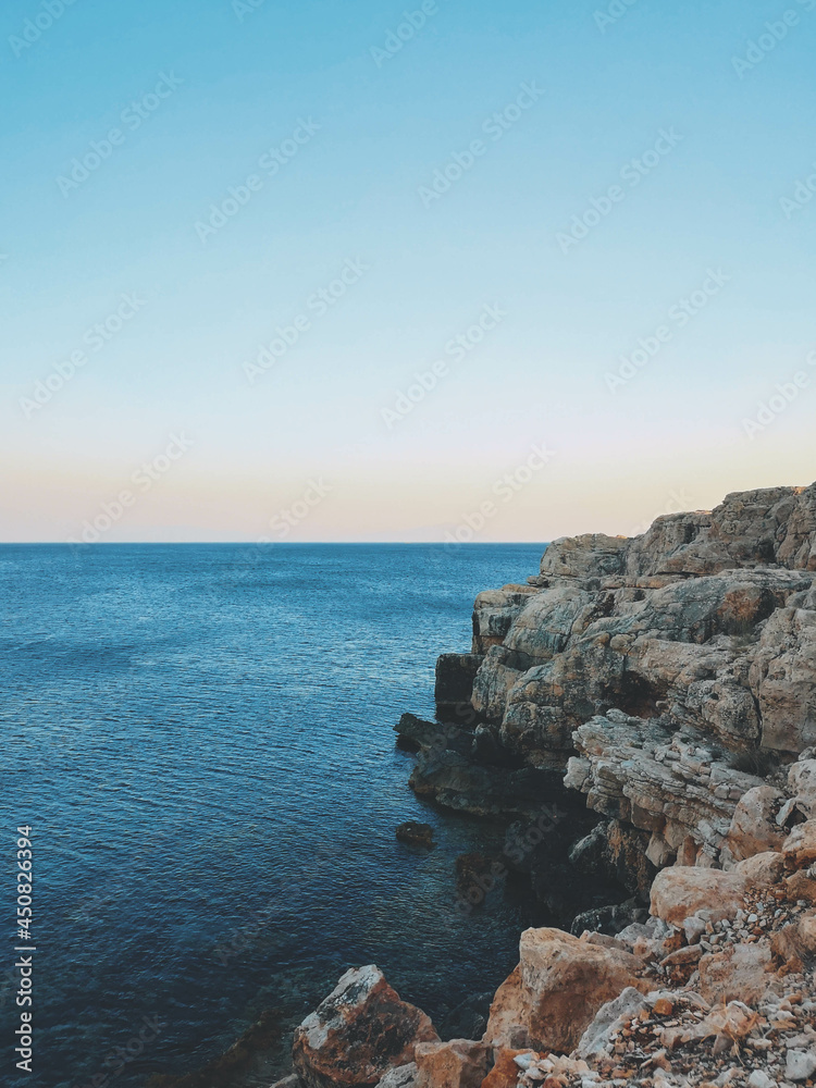 Sunset View with rocks and beautiful calm sea
