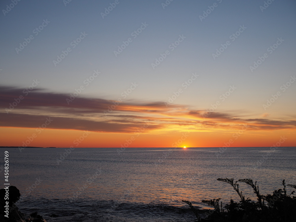 sunrise with clouds in coastal Maine