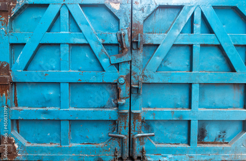 old vintage steel door blue in the old city