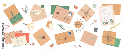 Set of different Christmas envelopes with mail, postage stamps and postcards, parcels, vector flat illustration.Set of various craft paper letters.