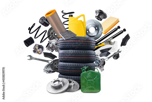 Konstfotografi A new tires and splash of a new spare parts isolated on white.
