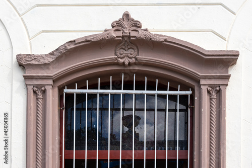 Colonial style architecture of a window in Las Tunas, Cuba photo