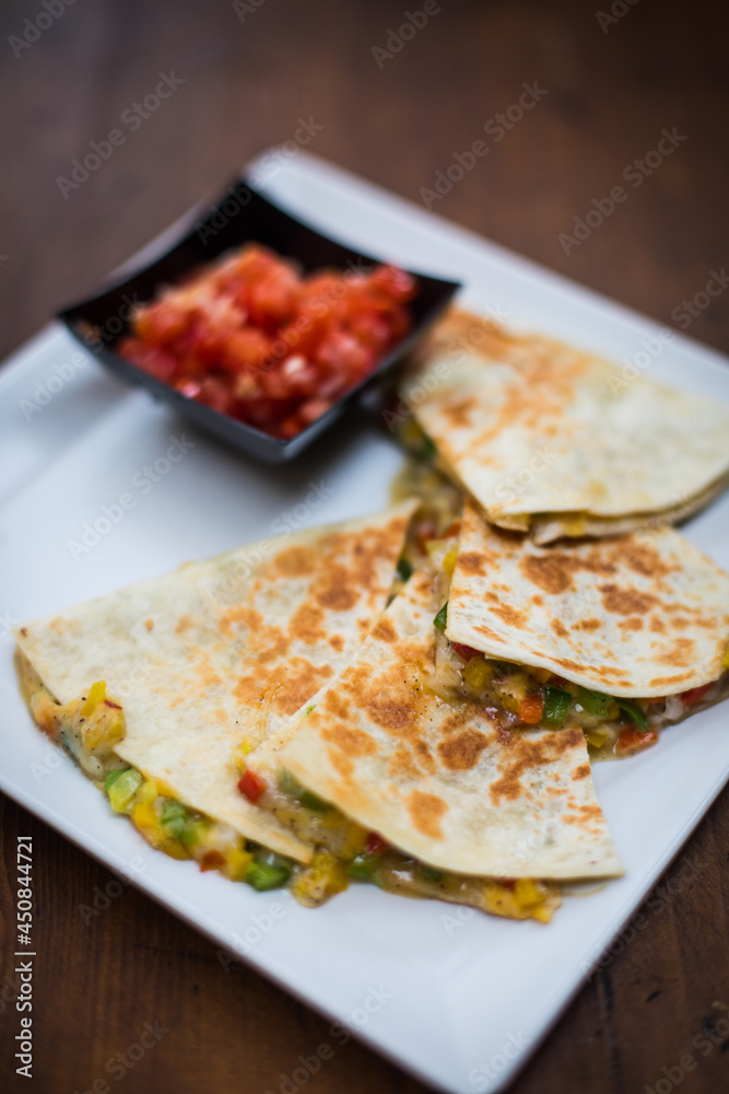 Quesadilla slices on a plate Quesadilla slices on a plate