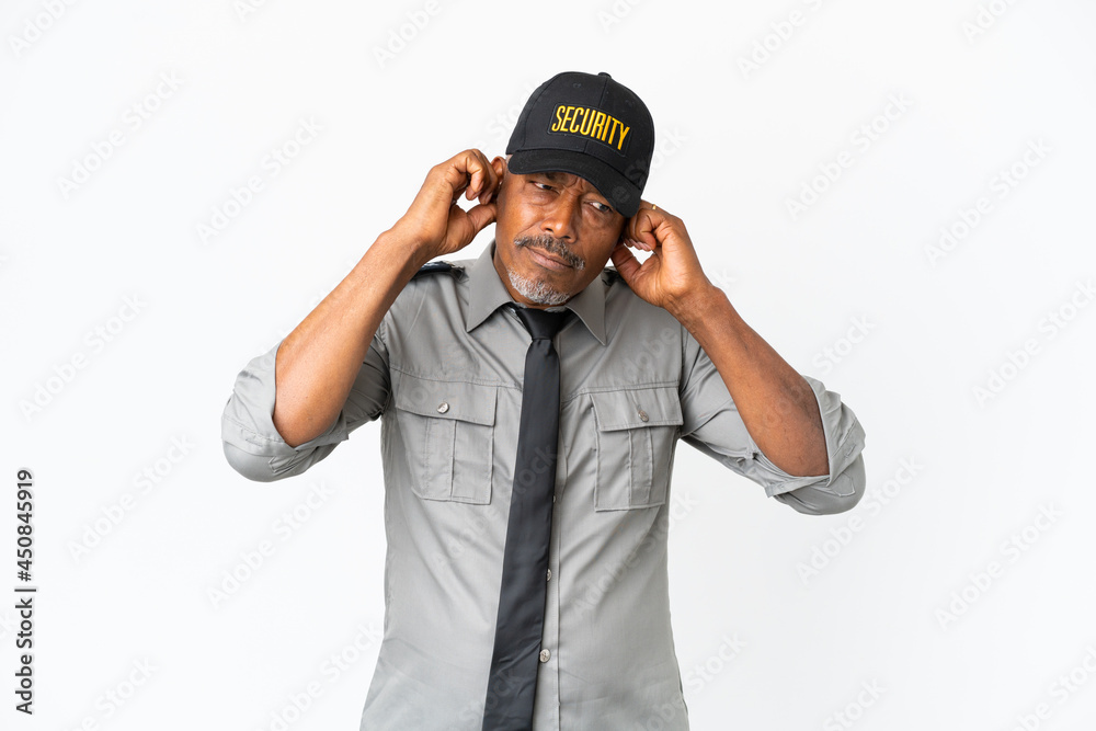 Senior staff man isolated on white background frustrated and covering ears Senior staff man isolated on white background frustrated and covering ears