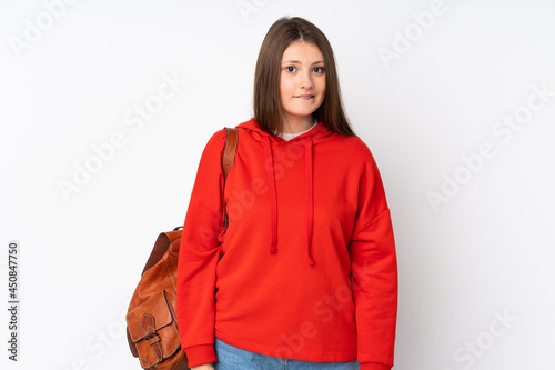 Teenager caucasian student girl isolated on white background having doubts and with confuse face expression © luismolinero