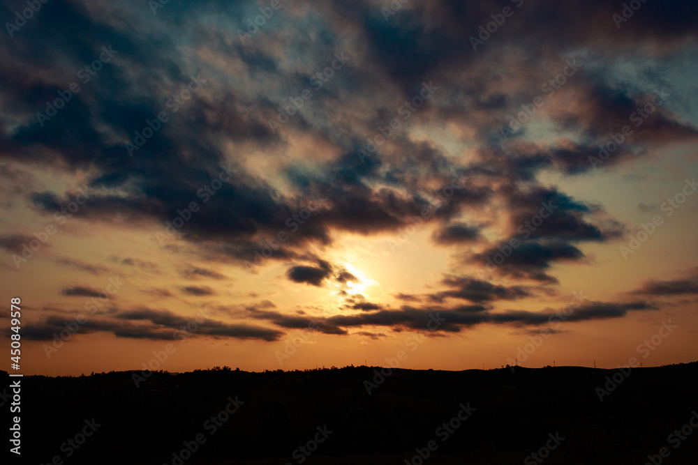 Obraz premium sunset over the clouds