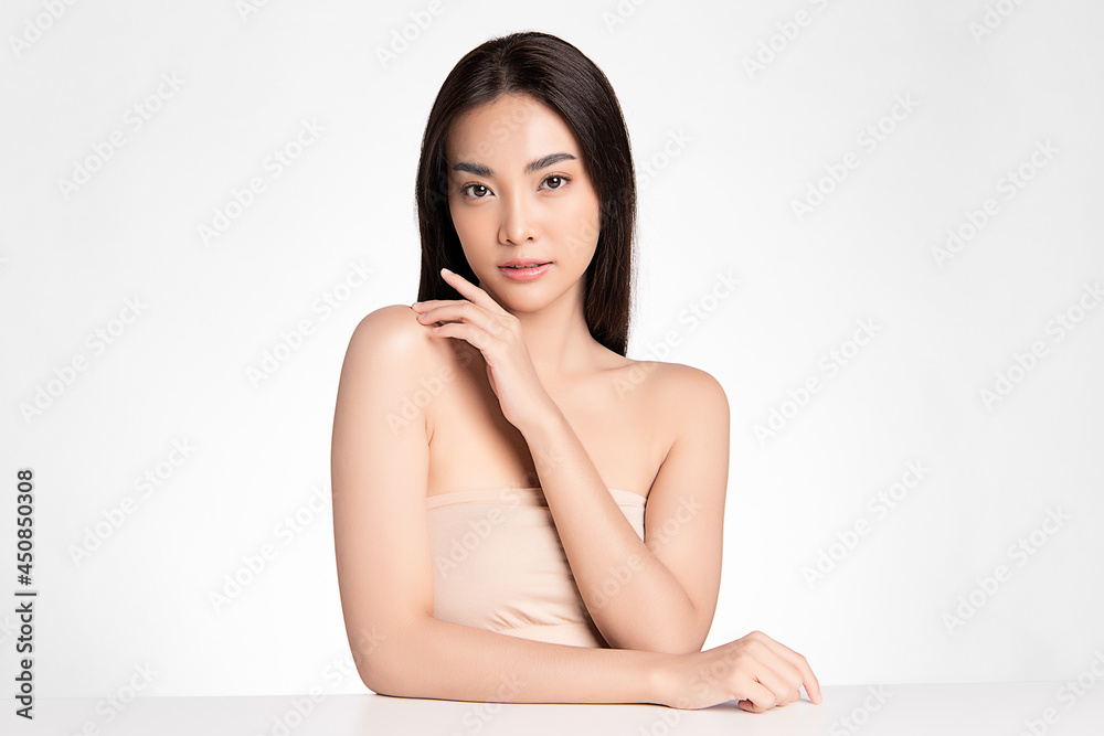 Beautiful young asian woman with clean fresh skin on white background, Face care, Facial treatment, Cosmetology, beauty and spa, Asian women portrait. Beautiful young asian woman with clean fresh skin on white background, Face care, Facial treatment, Cosmetology, beauty and spa, Asian women portrait.