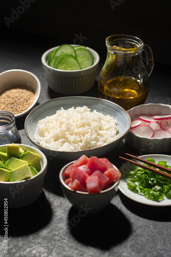 Ingredients of Traditional Hawaiian Poke Bowl prepared with Tuna Fish photo