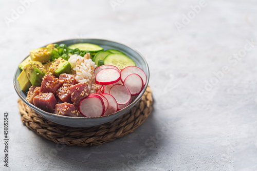 Close up shot of Traditional Hawaiian Poke Bowl prepared with Tuna Fish photo